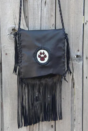 Black fringed handbag, beaded wolf paw design