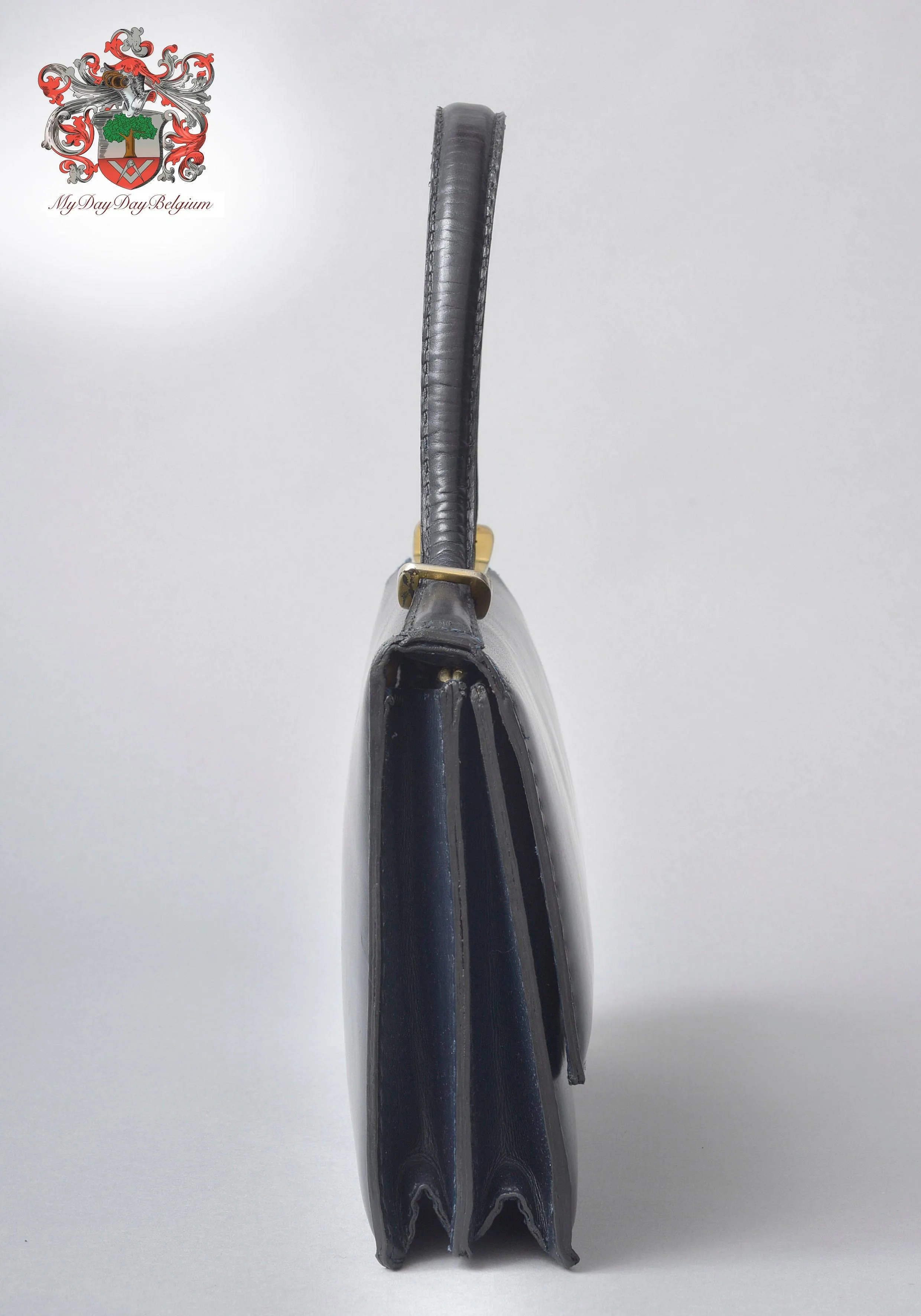 Delvaux vintage top handle handbag 1958