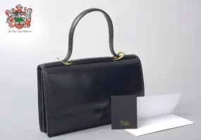 Delvaux vintage top handle handbag 1958